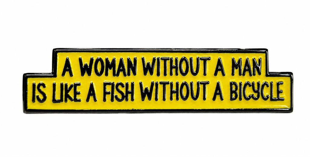 Black & Yellow Metal Enamel Pin Badge – “A Woman Without a Man Is Like a Fish Without a Bicycle”