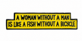 Black & Yellow Metal Enamel Pin Badge – “A Woman Without a Man Is Like a Fish Without a Bicycle”