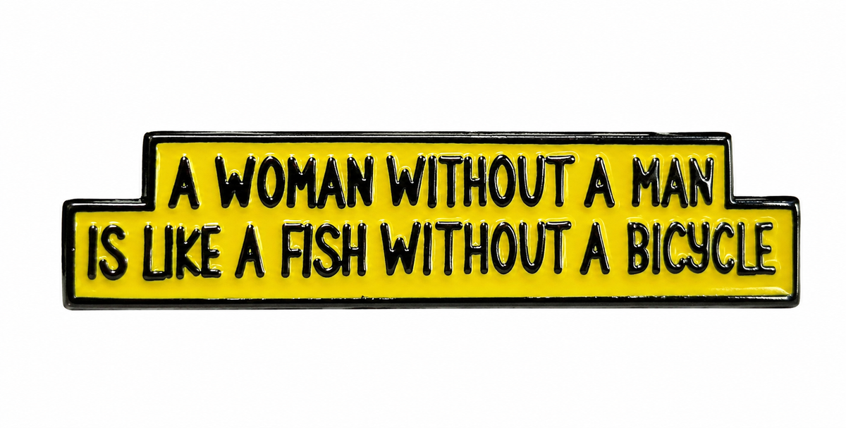 Black & Yellow Metal Enamel Pin Badge – “A Woman Without a Man Is Like a Fish Without a Bicycle”